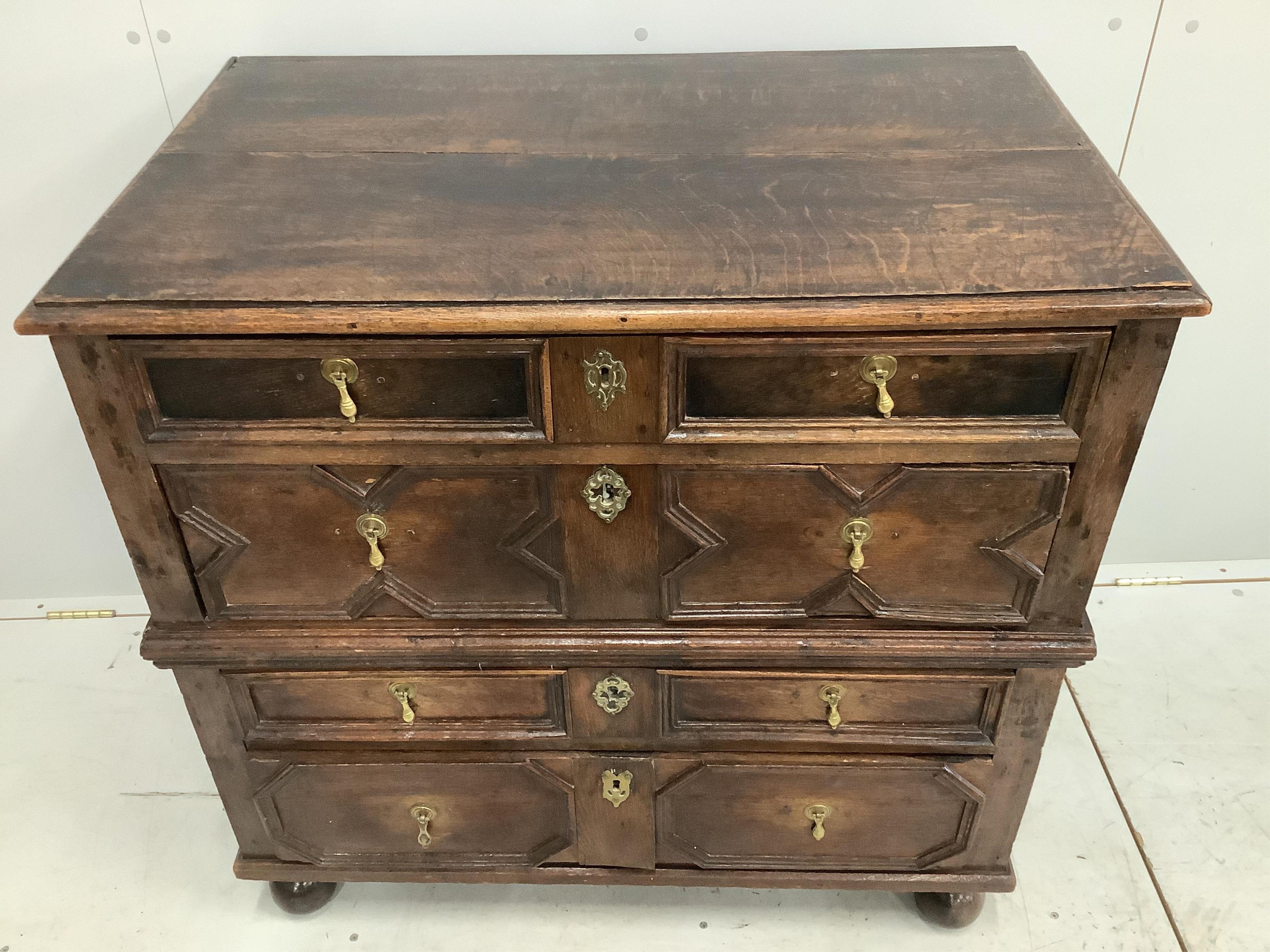 An early 18th century oak chest, width 92cm, depth 56cm, height 90cm. Condition - fair